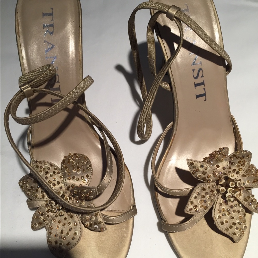 Gold strapped heels with flower decor